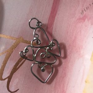 •STERLING SILVER• vintage twirling hearts pendant